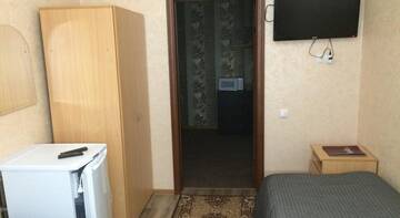 Фото номера Кровать в общем номере с 2 кроватями Гостевой дом Mini-Hotel Sibir г. Тарко-Сале 5